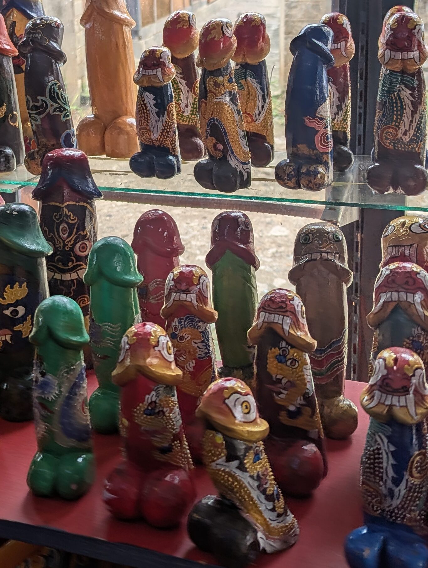 Many phallus displayed at a shop.